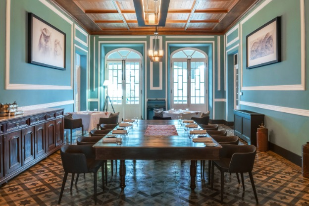 Roça Sundy formal dining room in restored heritage colours