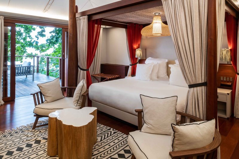 Sundy Praia Principe suite bedroom opening to a private terrace
