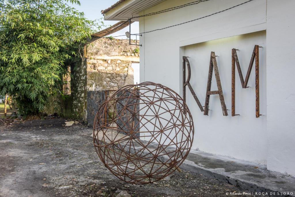 Contemporary art installation in the roça courtyard at Roça São João dos Angolares, São Tomé