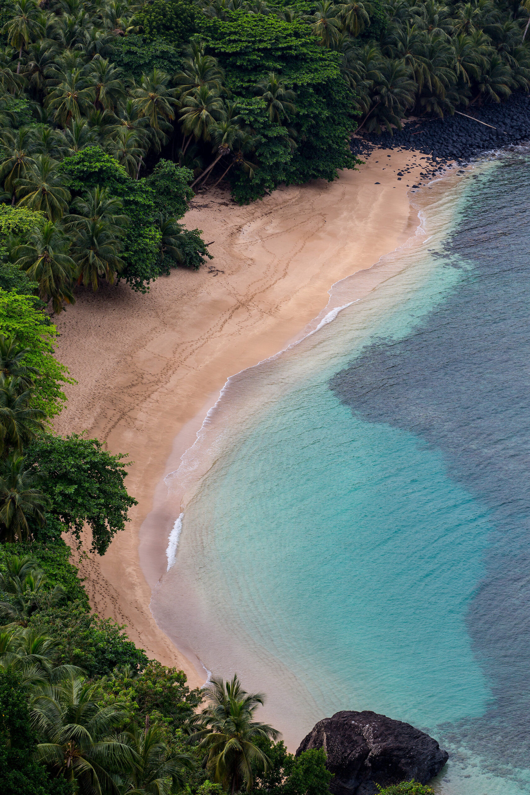 Secluded golden-sand beach below Belo Monte, Príncipe Island