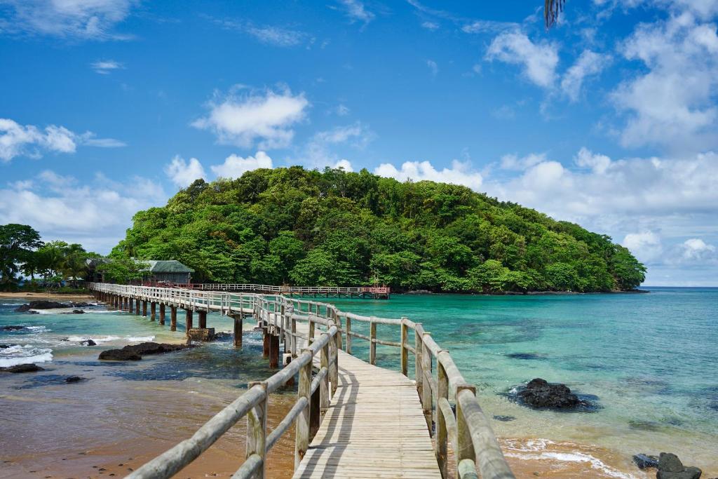 Bom Bom Island Resort wooden walking bridge between two islets on Príncipe
