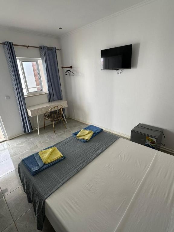 Hotel Kenito bedroom with workspace
