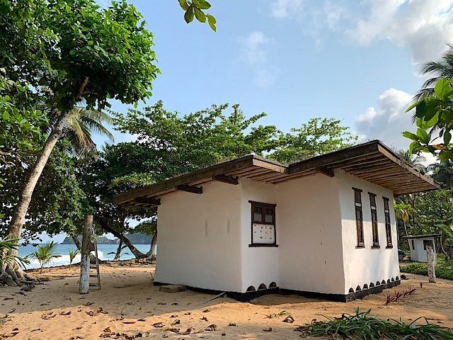 Rustic earth-and-wood bungalow on the sand at Jalé Ecolodge, Porto Alegre