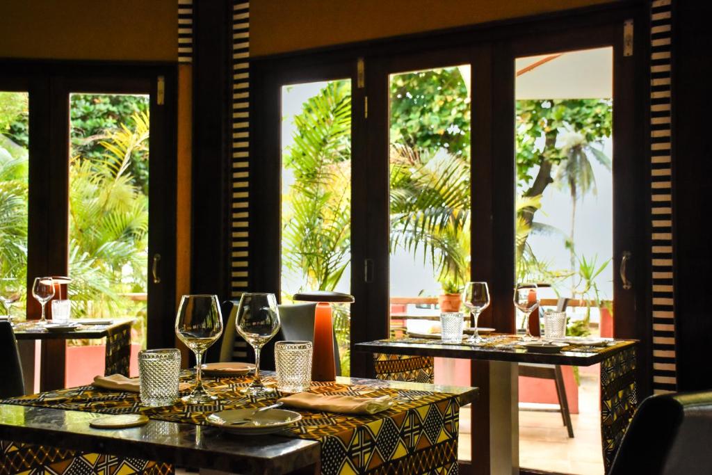 Omali Lodge restaurant interior with garden views, São Tomé