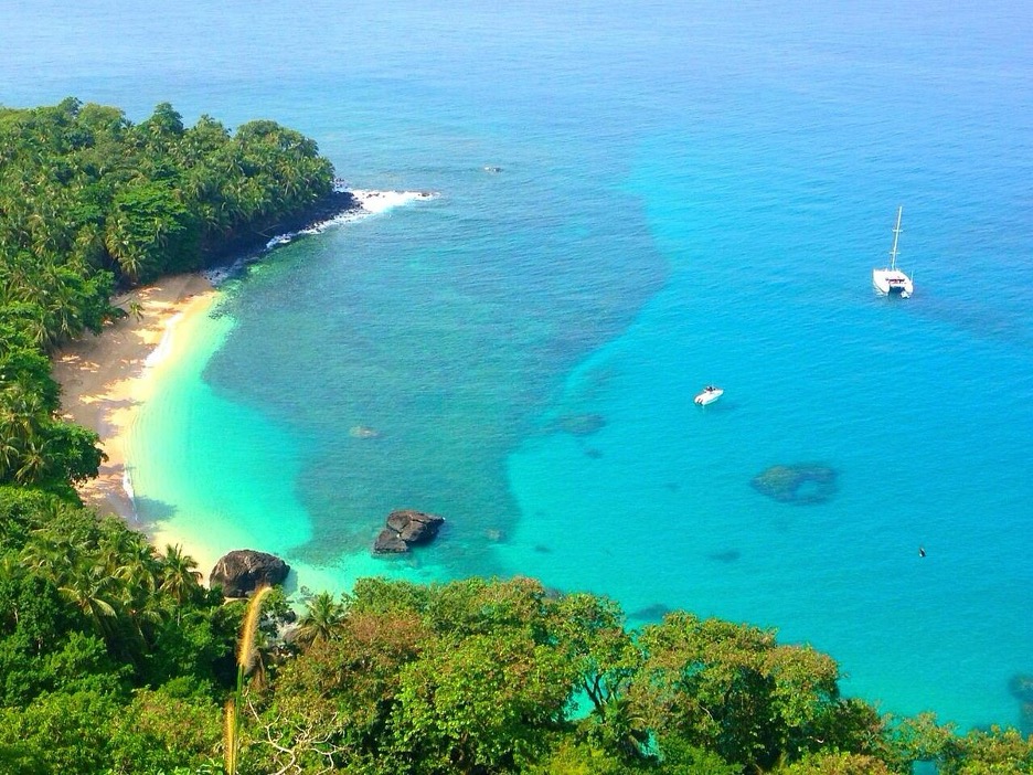 Banana Beach on Príncipe Island with golden sand and palm trees